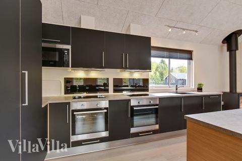 Köket i lyxstuga nr 356 är utrustat så att ni kan laga mat till 20 personer.