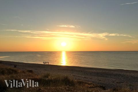 Stranden i närheten av lyxhus 361.