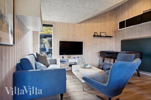 Tävla i sommarhusets aktivitetsrum när ni besöker lyxhus nr 371 i Vestjylland.