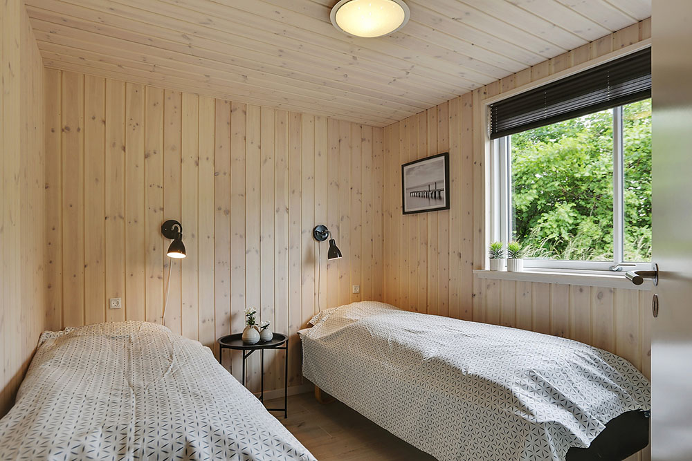 Ett av de 8 utmärkta sovrummen i lyxstuga nr 376 i Nordsjälland.