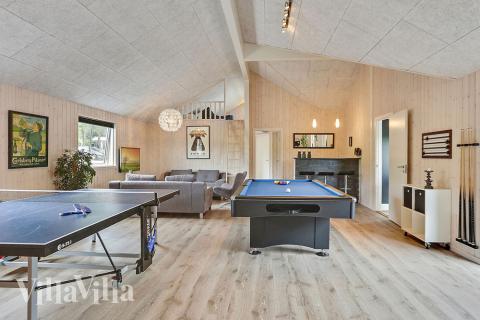 Tävla i sommarhusets aktivitetsrum när ni besöker lyxhus nr 375 i Nordsjälland.