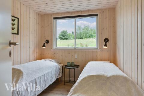 Ett av de 9 utmärkta sovrummen i lyxstuga nr 375 i Nordsjälland.