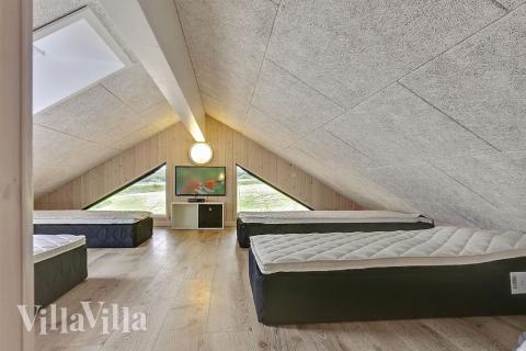 Några av de 24 sovplatserna finns på loftet i lyxstuga nr 375