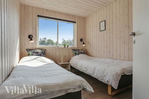 Ett av de 7 utmärkta sovrummen i lyxstuga nr 377 i Nordsjälland.