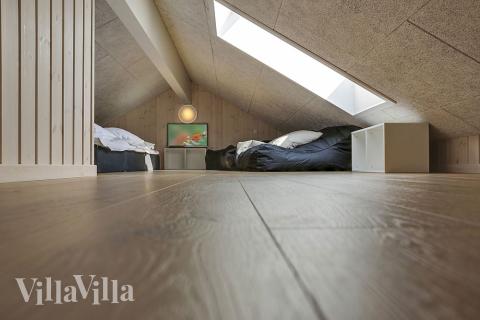 Några av de 18 sovplatserna finns på loftet i lyxstuga nr 377