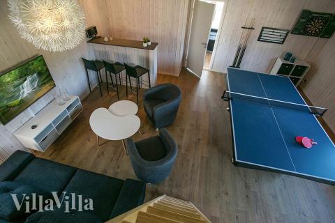 Tävla i sommarhusets aktivitetsrum när ni besöker lyxhus nr 377 i Nordsjälland.