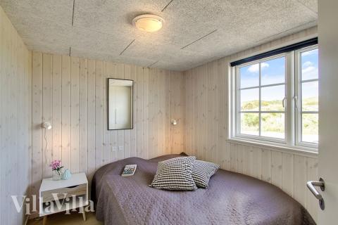 Ett av de 7 utmärkta sovrummen i lyxstuga nr 383 i Vestjylland.