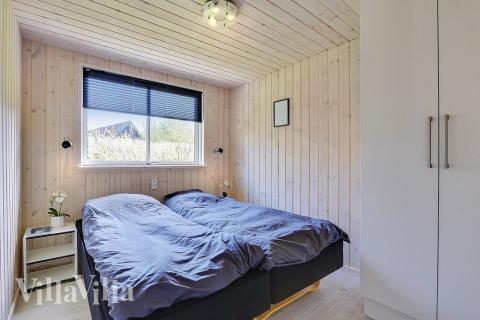 Ett av de 7 utmärkta sovrummen i lyxstuga nr 384 i Nordsjälland.