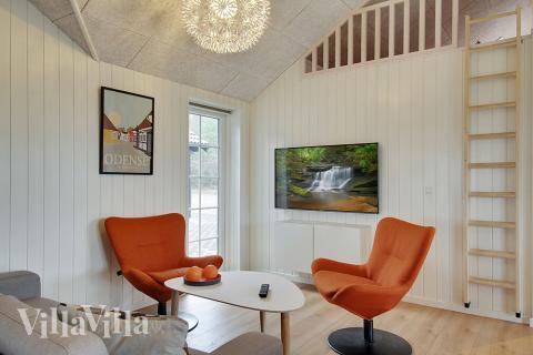 Aktivitetsrum i lyxstuga nr 386 med 7 sovrum och plats för 18 personer.