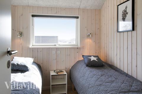 Ett av de 5 utmärkta sovrummen i lyxstuga nr 380 i Østjylland.