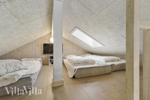 Några av de 14 sovplatserna finns på loftet i lyxstuga nr 380