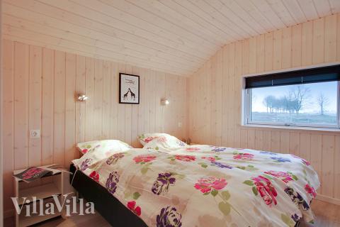 Ett av de 5 utmärkta sovrummen i lyxstuga nr 702 i Tyskland.