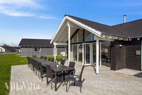 Njut av en grillkväll på terrassen i lyxstuga nr 704 i Tyskland