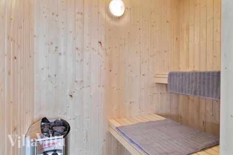 Njut av bastuvärmen i lyxstuga nr 710 för 18 personer