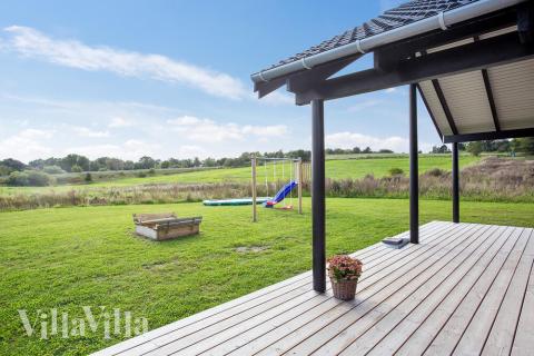 Den tjusiga sommarstugan nr 395 med gott om plats för upp till 20 personer