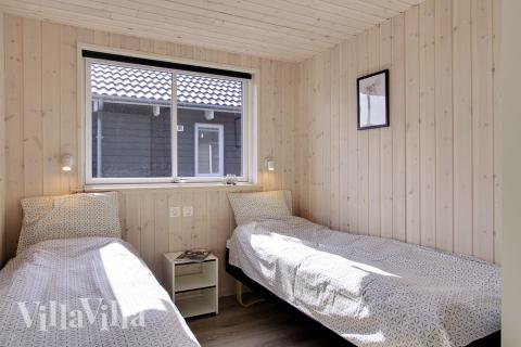 Ett av de 6 utmärkta sovrummen i lyxstuga nr 713 i Tyskland.