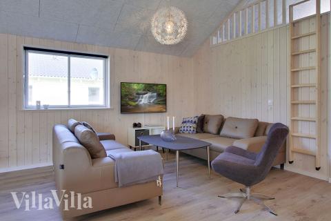 Aktivitetsrum i lyxstuga nr 706 med 9 sovrum och plats för 24 personer.