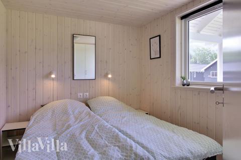 Ett av de 9 utmärkta sovrummen i lyxstuga nr 706 i Tyskland.