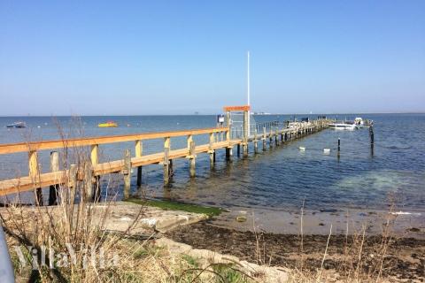 Stranden i närheten av lyxhus 706.