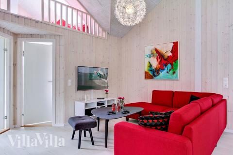 Aktivitetsrum i lyxstuga nr 715 med 8 sovrum och plats för 20 personer.