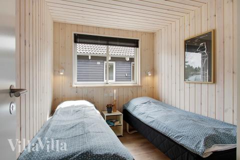 Ett av de 7 utmärkta sovrummen i lyxstuga nr 399 i Vestjylland.
