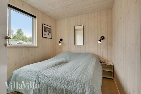 Ett av de 6 utmärkta sovrummen i lyxstuga nr 388 i Nordsjälland.