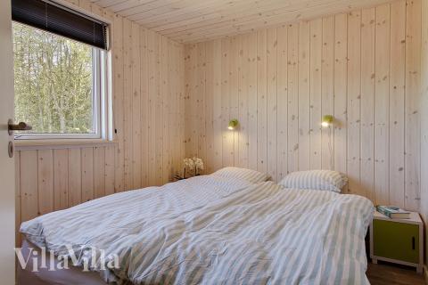 Ett av de 7 utmärkta sovrummen i lyxstuga nr 397 i Nordsjälland.