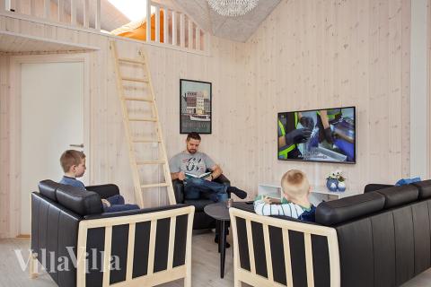 Tävla i sommarhusets aktivitetsrum när ni besöker lyxhus nr 398 i Nordsjälland.