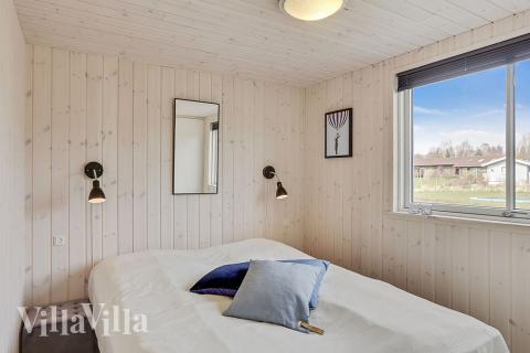 Ett av de 8 utmärkta sovrummen i lyxstuga nr 398 i Nordsjälland.