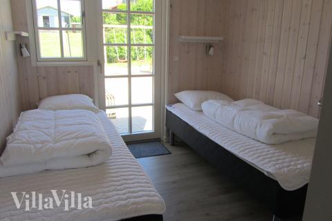 Ett av de 9 utmärkta sovrummen i lyxstuga nr 400 i Østjylland.