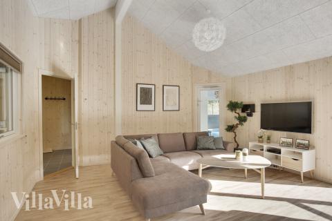 Ni kan sitta 24 personer tillsammans i vardagsrummet när ni besöker lyxhus nr 406 i Nordsjälland.