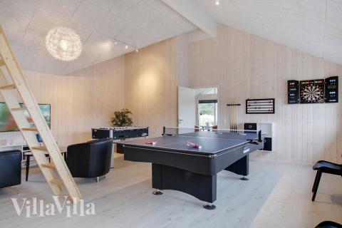 Tävla i sommarhusets aktivitetsrum när ni besöker lyxhus nr 407 i Vestjylland.