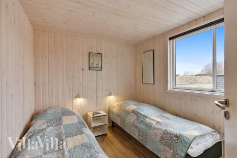 Ett av de 7 utmärkta sovrummen i lyxstuga nr 408 i Nordjylland.