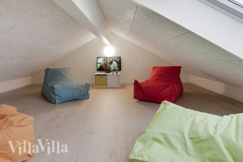 Några av de 26 sovplatserna finns på loftet i lyxstuga nr 415