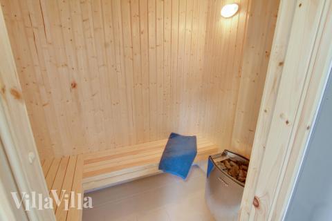 Njut av bastuvärmen i lyxstuga nr 410 för 20 personer