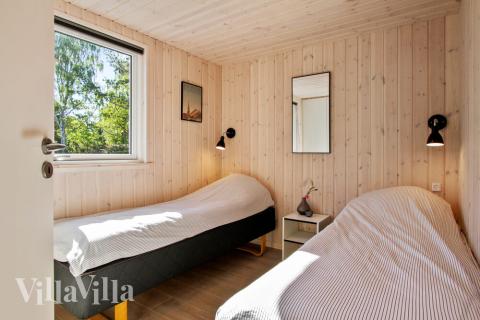 Ett av de 8 utmärkta sovrummen i lyxstuga nr 410 i Nordsjälland.