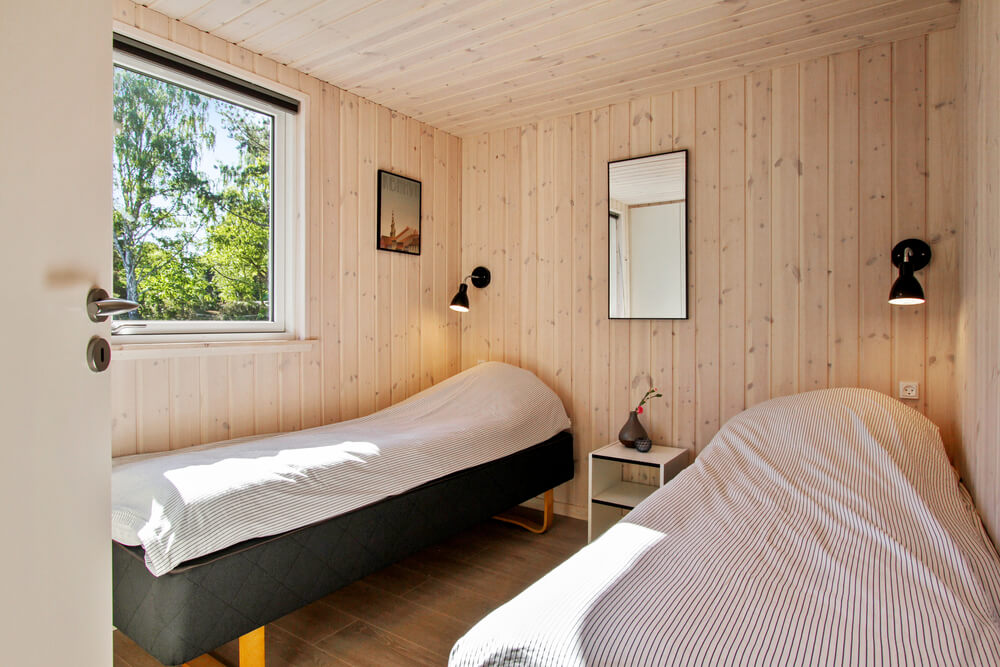 Ett av de 8 utmärkta sovrummen i lyxstuga nr 410 i Nordsjälland.