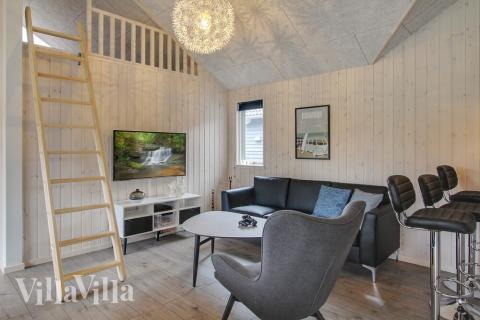 Tävla i sommarhusets aktivitetsrum när ni besöker lyxhus nr 409 i Vestjylland.