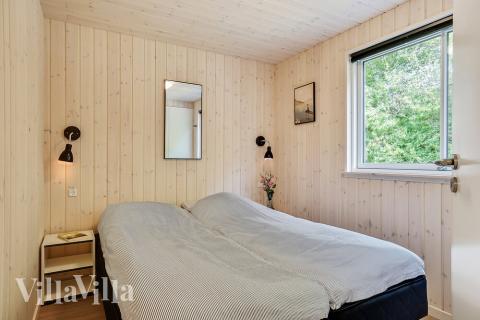 Ett av de 6 utmärkta sovrummen i lyxstuga nr 416 i Nordsjälland.