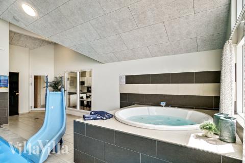 Njut av spabadets värme i lyxstuga nr 416 i Nordsjälland