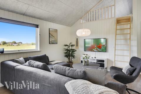 Tävla i sommarhusets aktivitetsrum när ni besöker lyxhus nr 403 i Lolland/Falster/Møn.