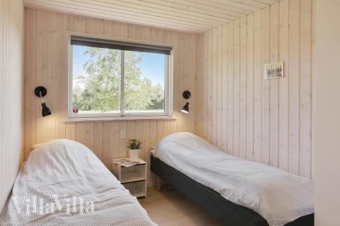 Ett av de 7 utmärkta sovrummen i lyxstuga nr 413 i Lolland/Falster/Møn.