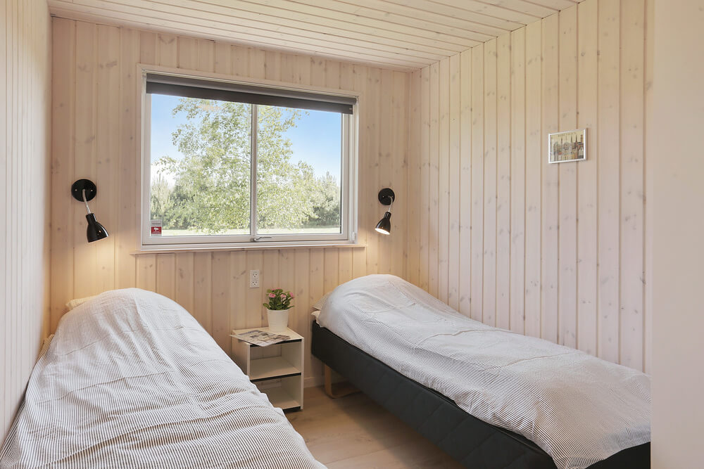 Ett av de 7 utmärkta sovrummen i lyxstuga nr 413 i Lolland/Falster/Møn.