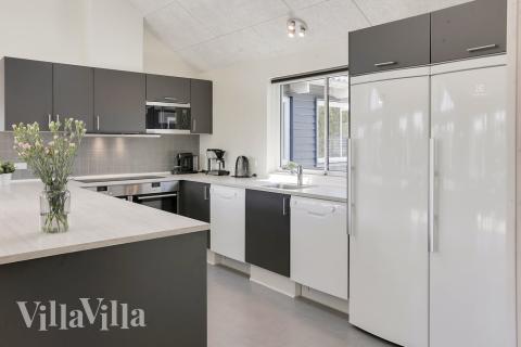 Köket i lyxstuga nr 413 är utrustat så att ni kan laga mat till 20 personer.