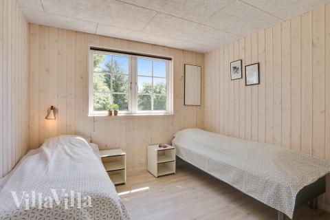 Ett av de 9 utmärkta sovrummen i lyxstuga nr 419 i Vestjylland.