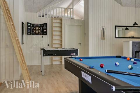 Aktivitetsrum i lyxstuga nr 419 med 9 sovrum och plats för 24 personer.