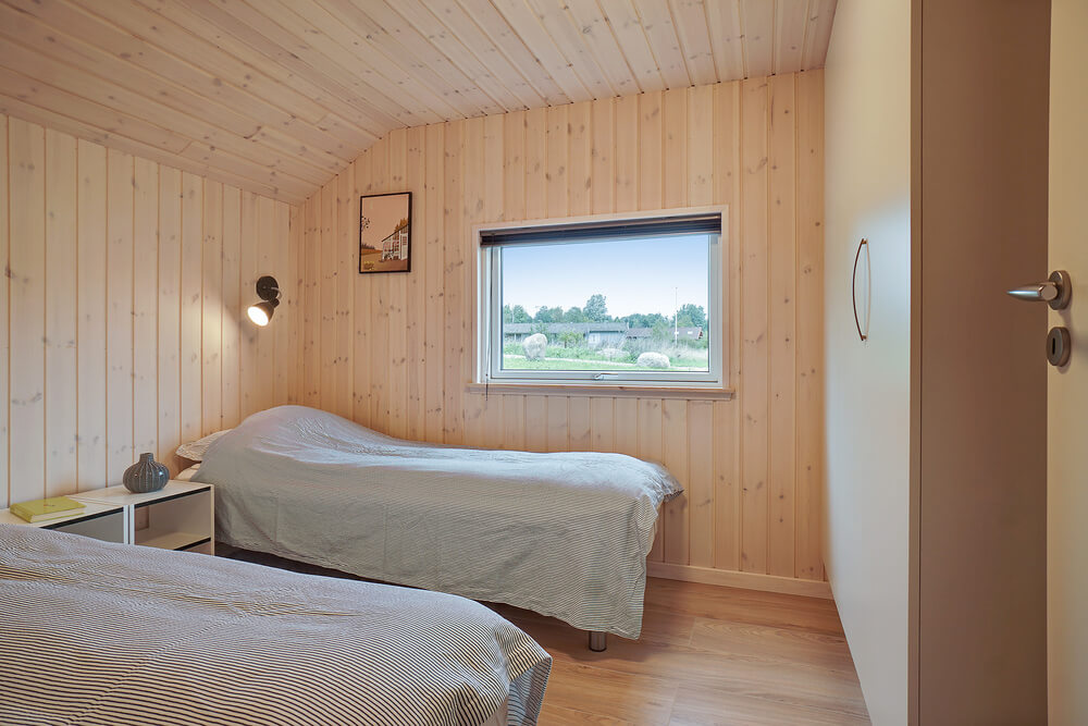 Ett av de 5 utmärkta sovrummen i lyxstuga nr 417 i Nordsjälland.