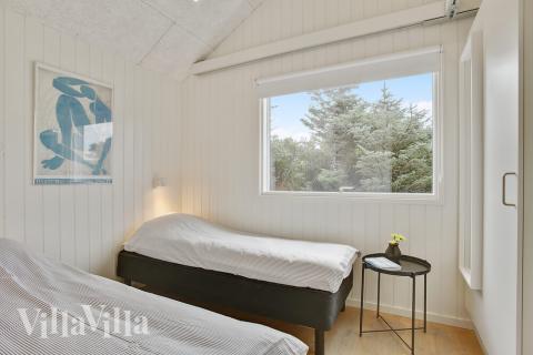 Ett av de 5 utmärkta sovrummen i lyxstuga nr 411 i Nordjylland.