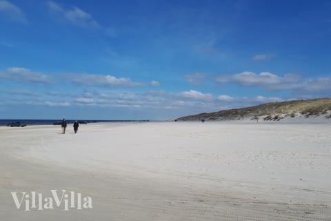 Stranden i närheten av lyxhus 411.