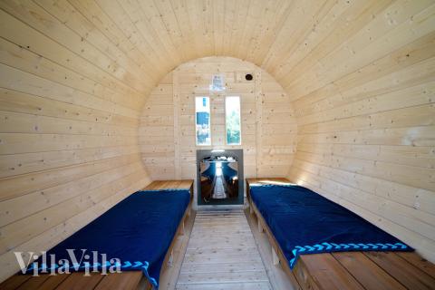 Njut av bastuvärmen i lyxstuga nr 412 för 24 personer